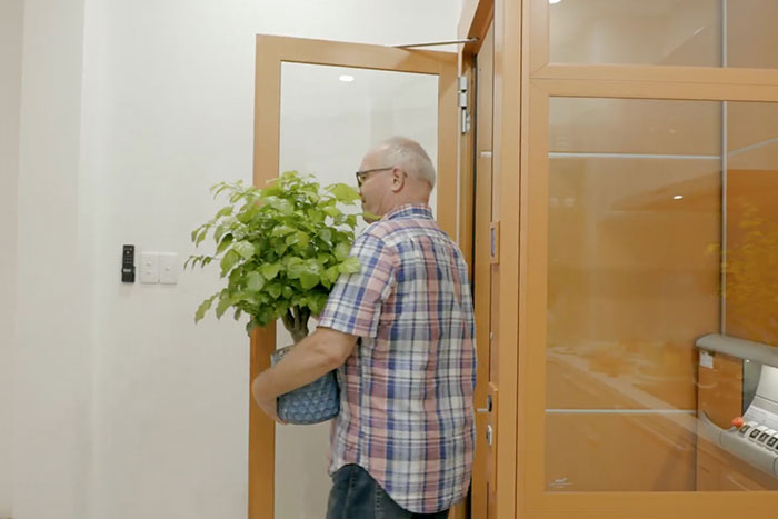 the man entering the elderly lift